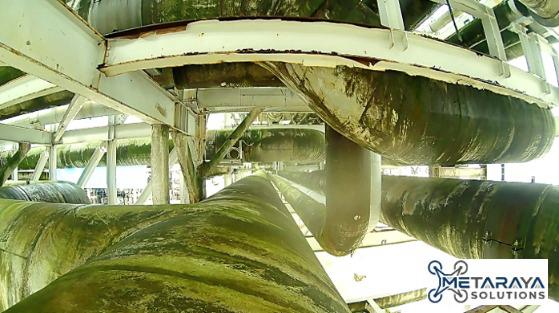 Pipe rack inspected from beneath, close to the waterline