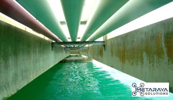 Pipe rack over a water channel